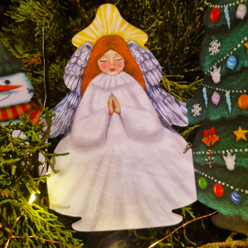A close up on the Christmas angel- a detail of the Christmas garland.